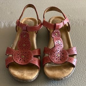 Red Velcro strap sandals
